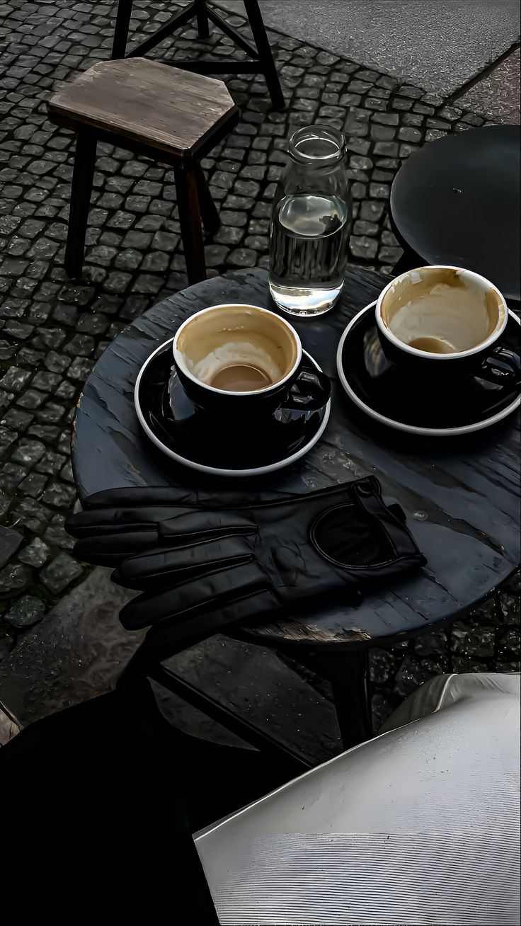 Cups of coffee at an outdoor cafe table
